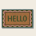 Doormat with 'HELLO' text on a beige background