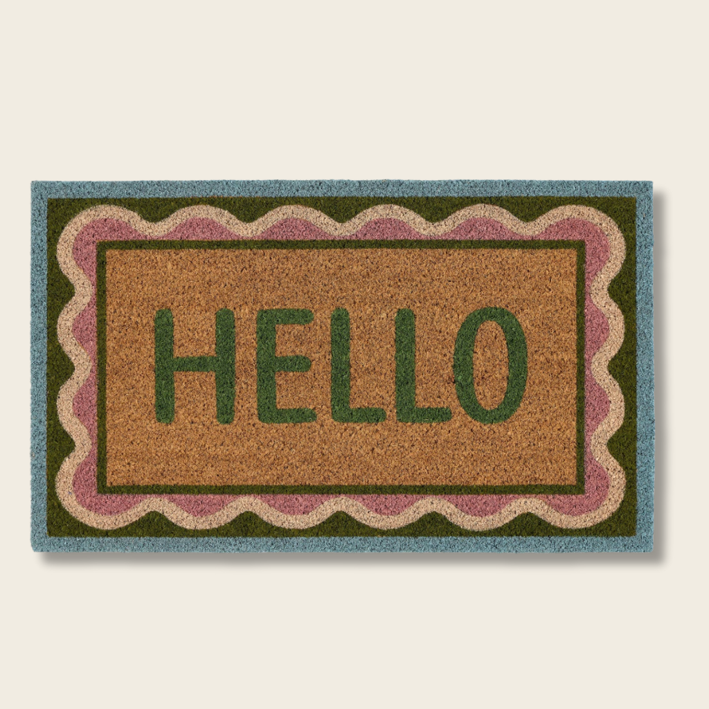 Doormat with 'HELLO' text on a beige background