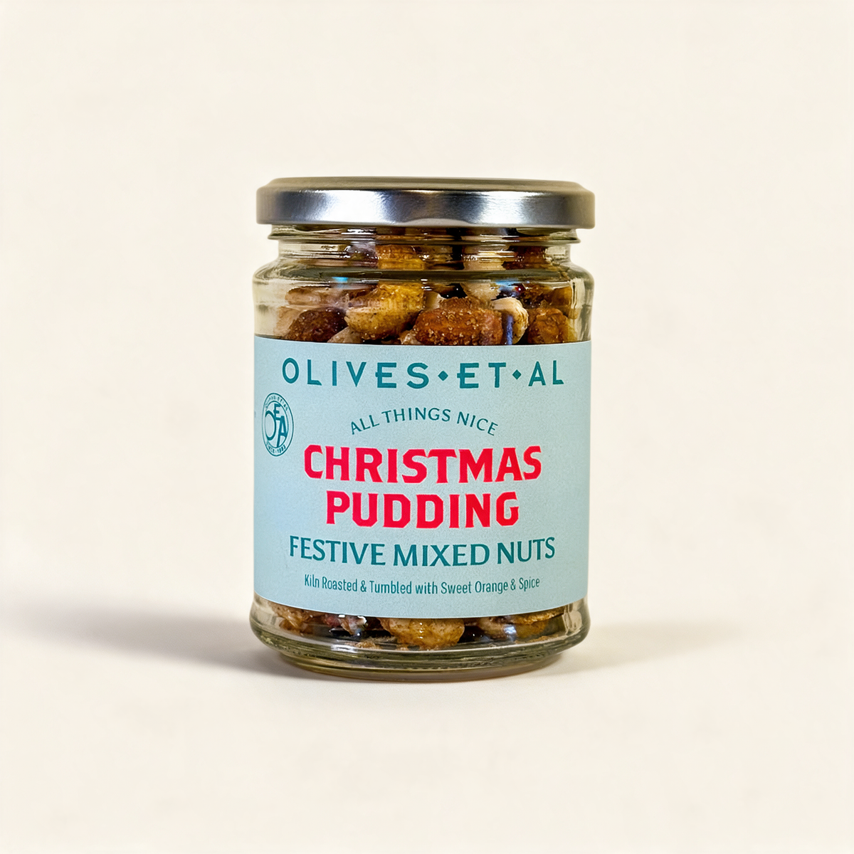 Christmas Pudding Mixed Kiln Roasted Nuts on a cream background