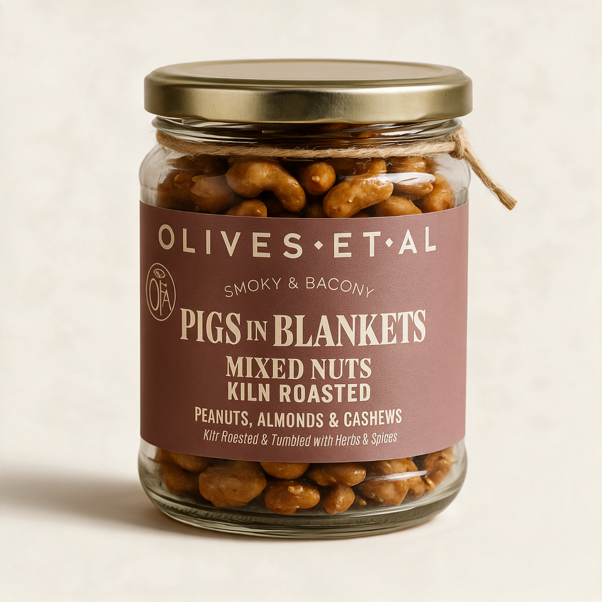 Pigs in Blankets Mixed Nuts on a cream background