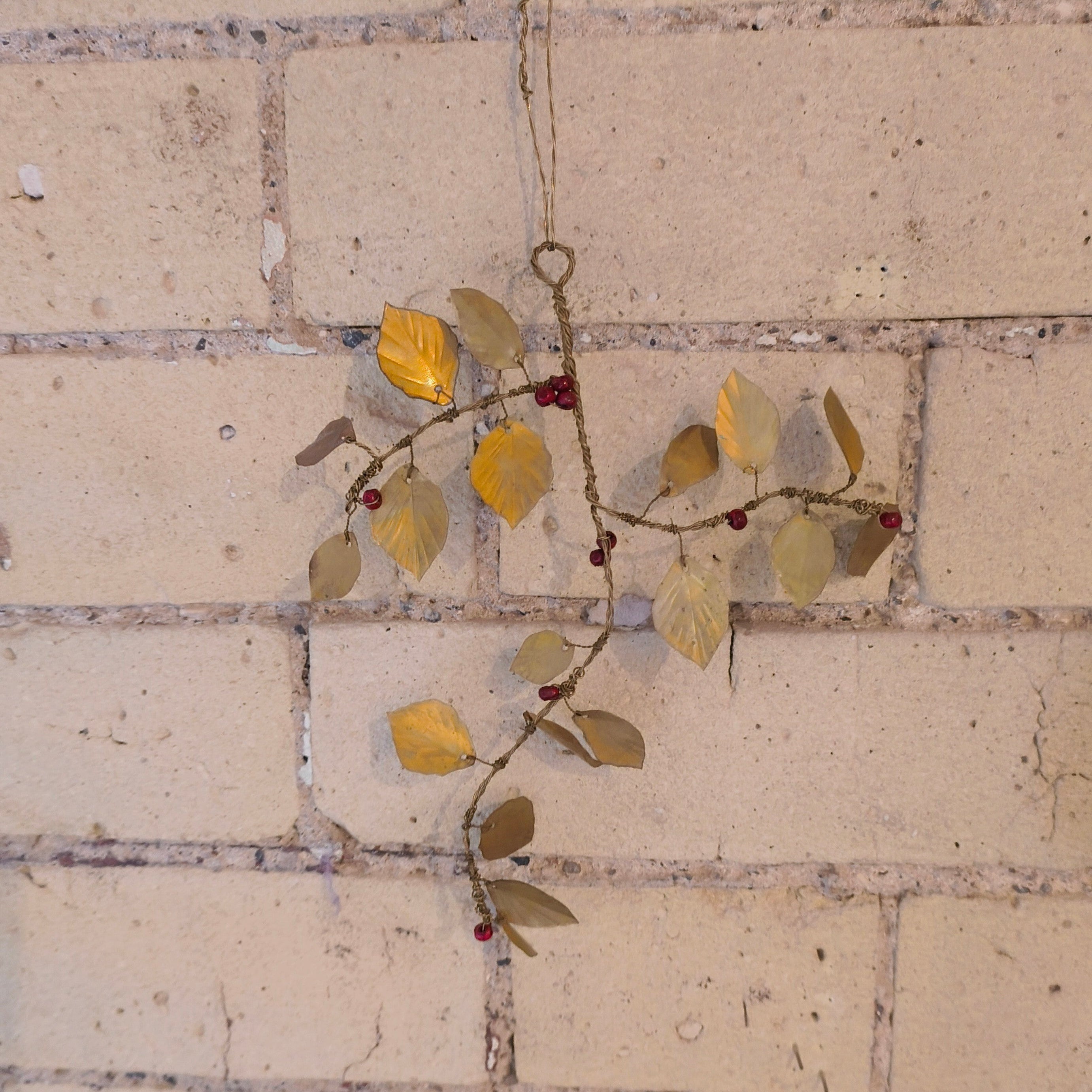 aged brass iron mistletoe decoration