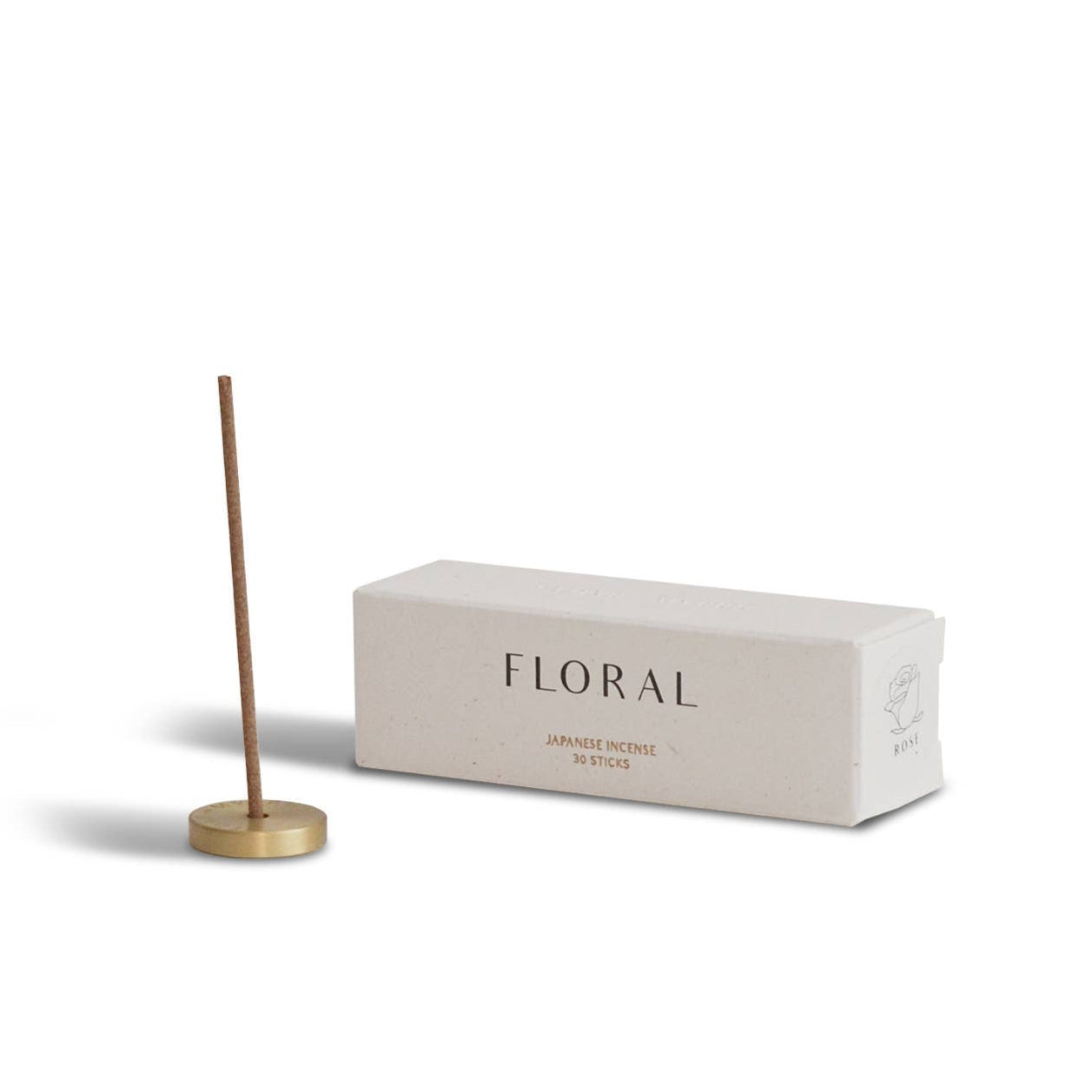 Incense stick with a box labeled 'Floral' on a white background