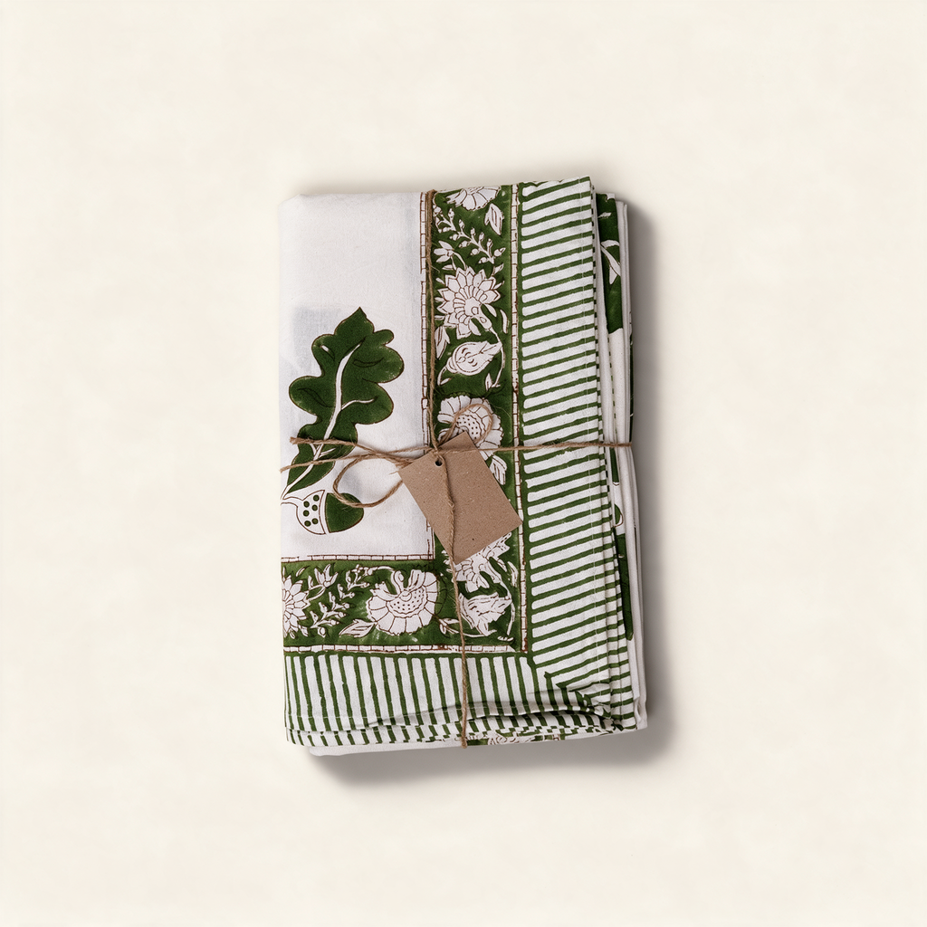 Khaki cotton tablecloth with an oak leaf block print and bordered edge