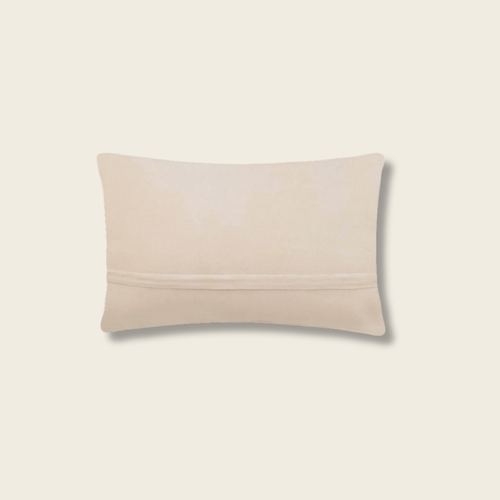 Beige pillow on a light beige background