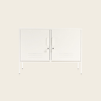 White wall-mounted cabinet with two doors on a light beige background