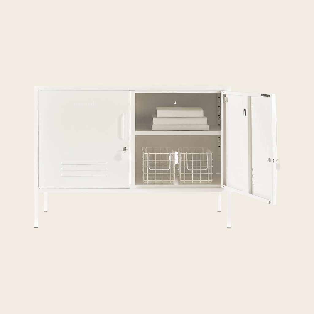 White storage cabinet with glass doors on a white background