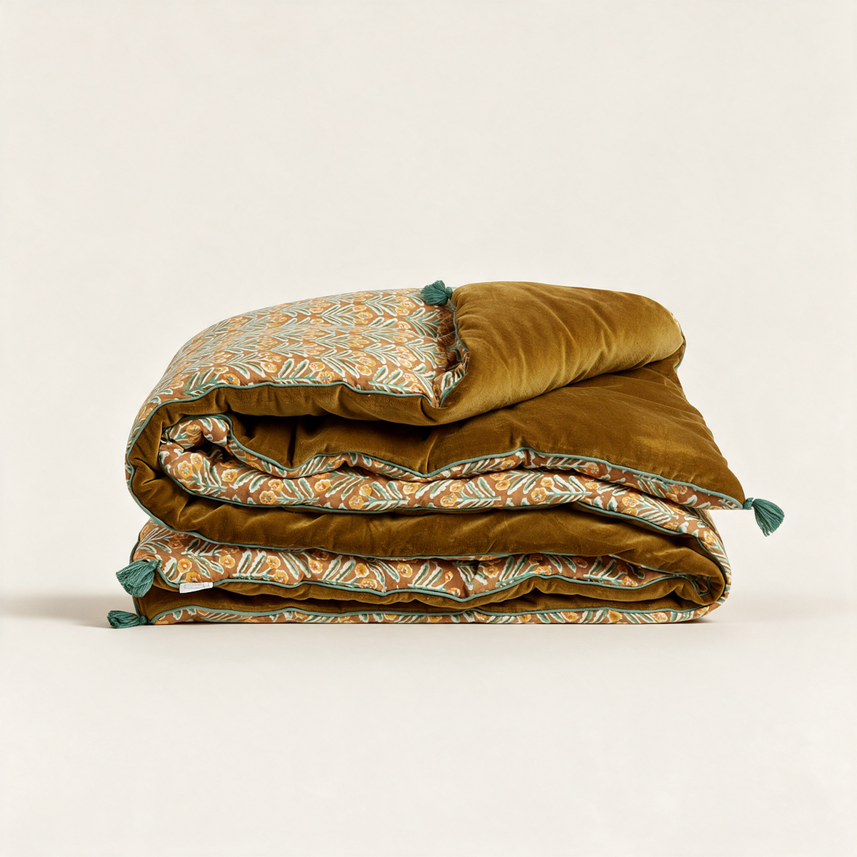 Mahal Bronze block-print sofa cover with tassels