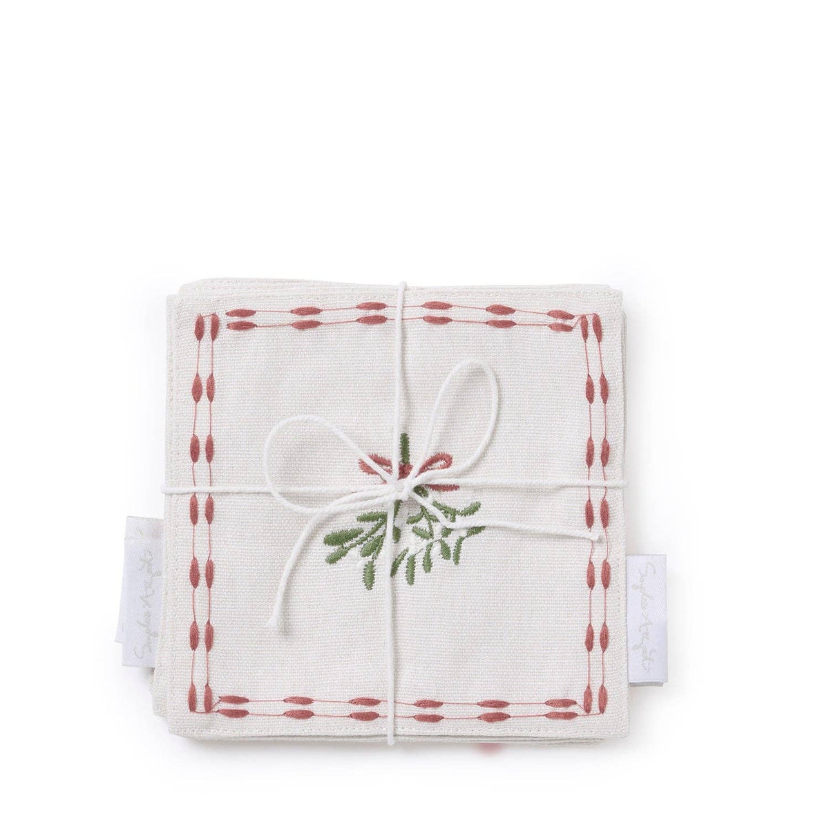 Set of mistletoe embroidered drink napkins stacked