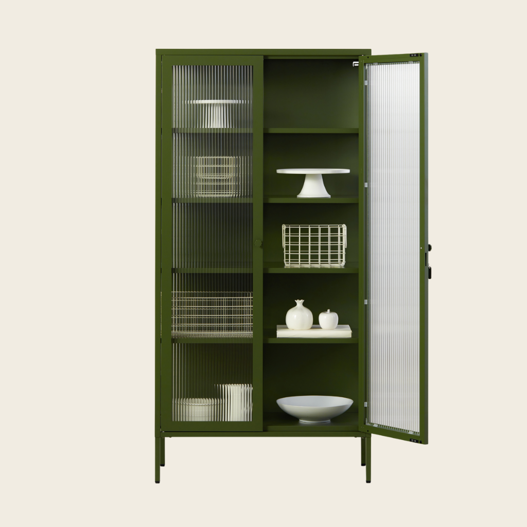 Green metal cabinet with glass doors on a beige background