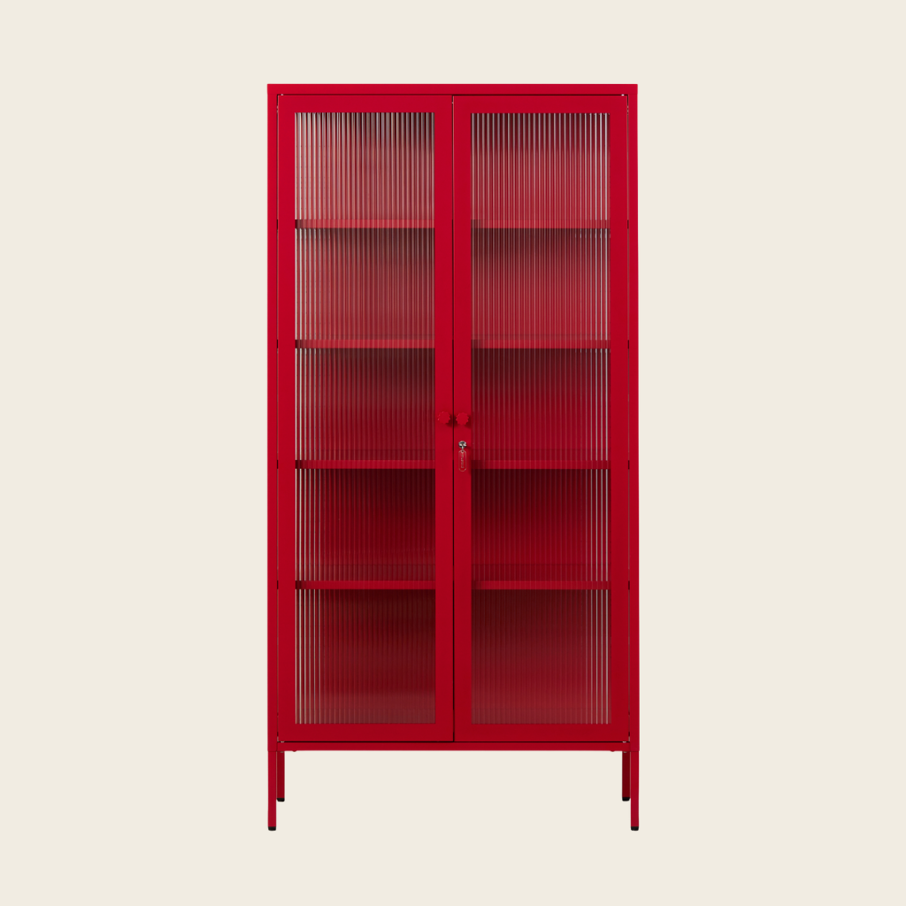 Red metal cabinet with glass doors on a beige background