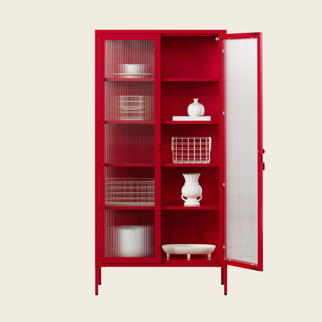Red cabinet with open door on a beige background