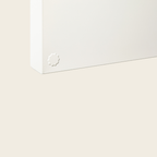 White rectangular box with a brand logo on a light beige background
