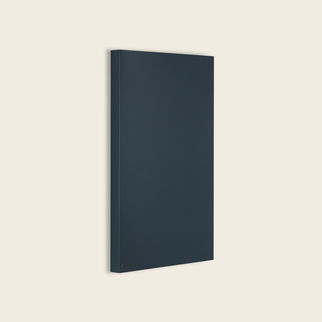 Dark grey notebook on a beige background