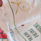 Decorative napkin with artistic designs on a wooden surface