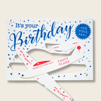 Birthday card with airplane design and celebratory text on a beige background