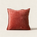 Squash coral terracotta velvet cushion cover, 50 x 50 cm, on a cream background