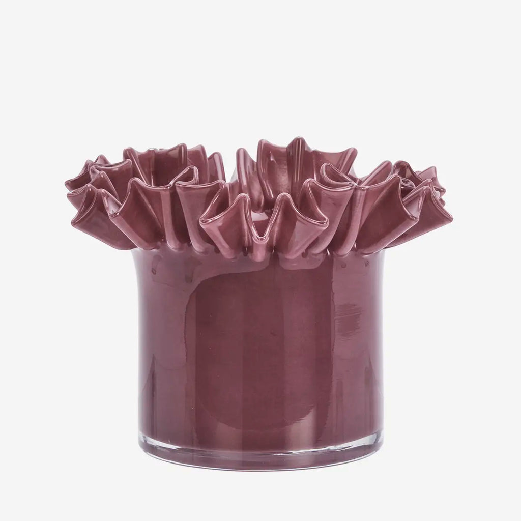 Purple ruffled vase on a white background