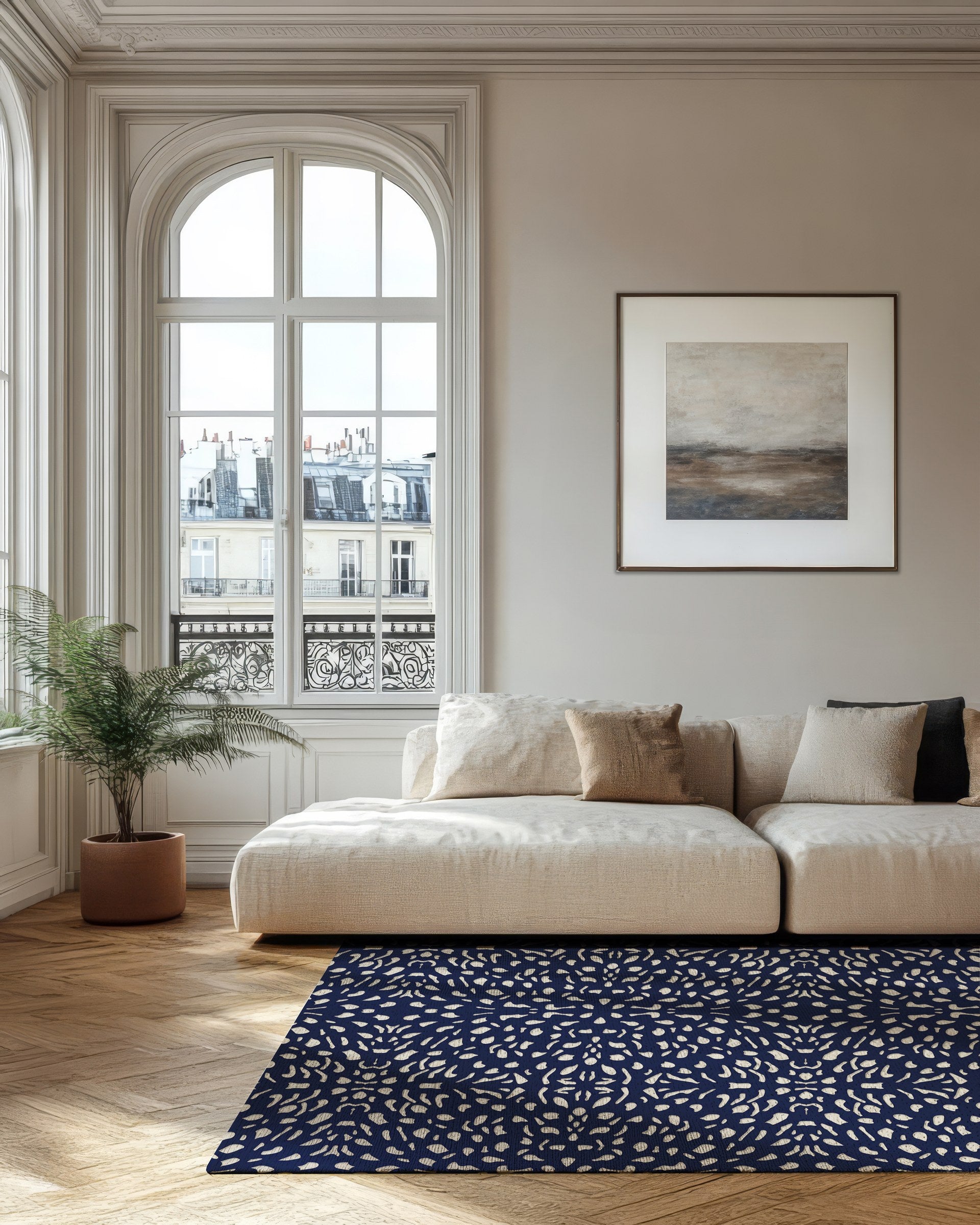 Pluma ink rug styled in a bright, pale living room