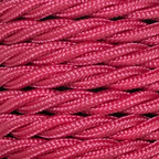 Close-up of pink braided cord on a beige background