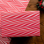 parcel wrapped in red and white marbled wrapping paper