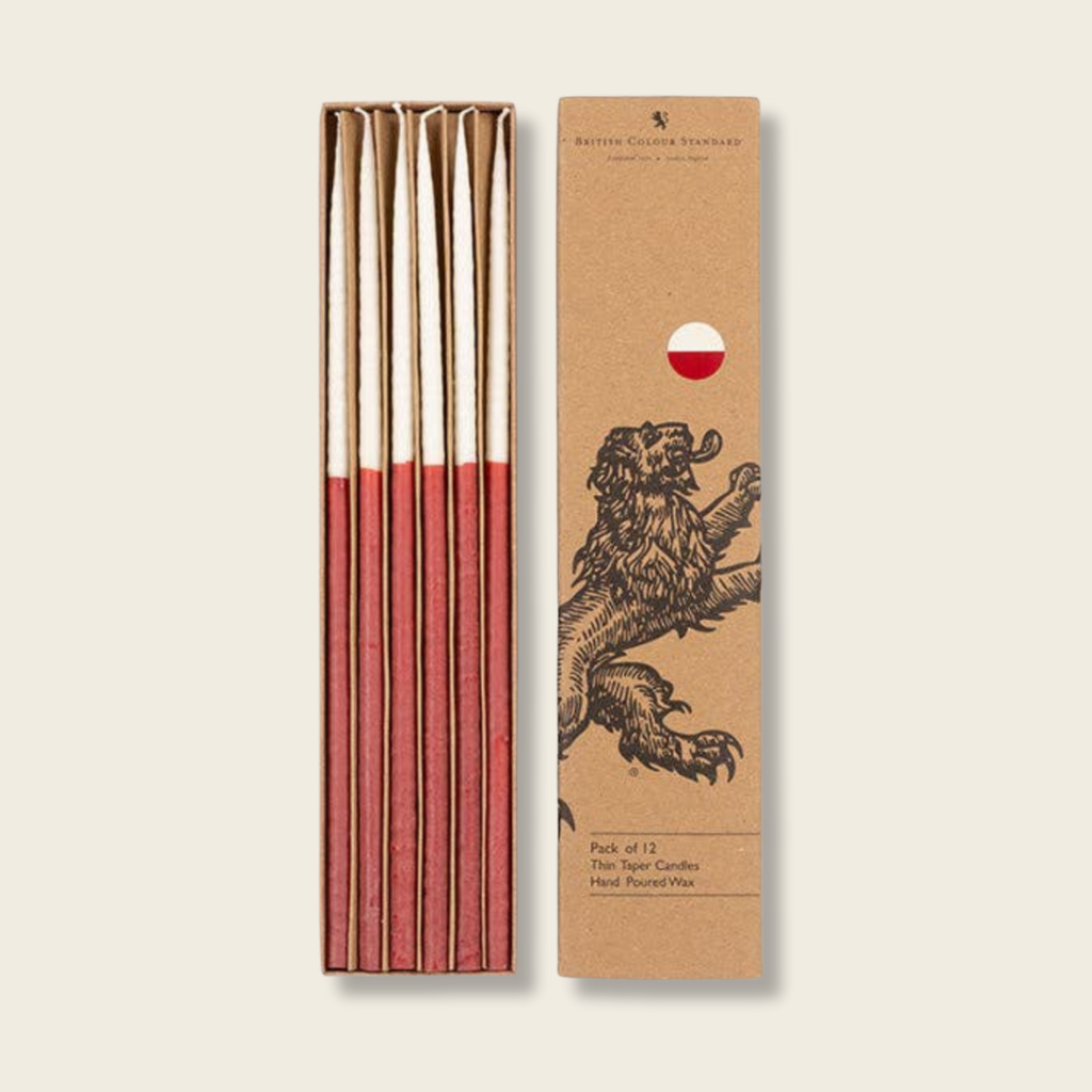 white Thin taper candles dipped in red wax presented in cardboard box british colour standard