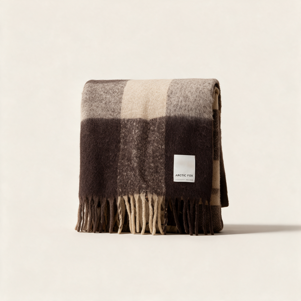 The Reykjavik Throw in dark earth brown, a recycled brushed fleece blanket