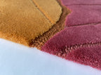 Close up of the Ripple horizon rug showing the cut and loop pile and fine wave lines