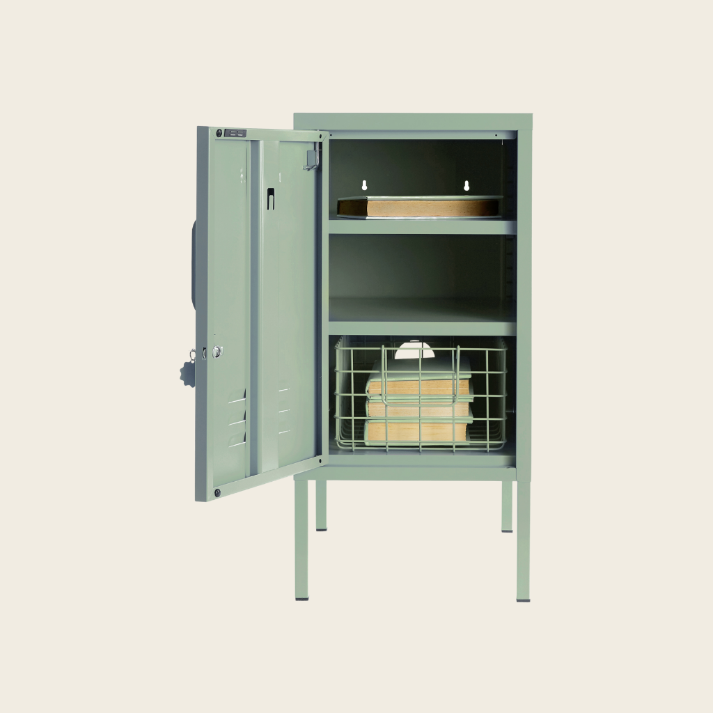 Sage metal locker on a beige background internal 