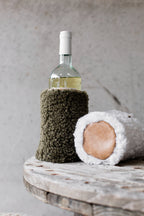 Close detail of the sheepskin and leather on the wine cooler
