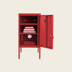 Red metal locker with open door on a beige background