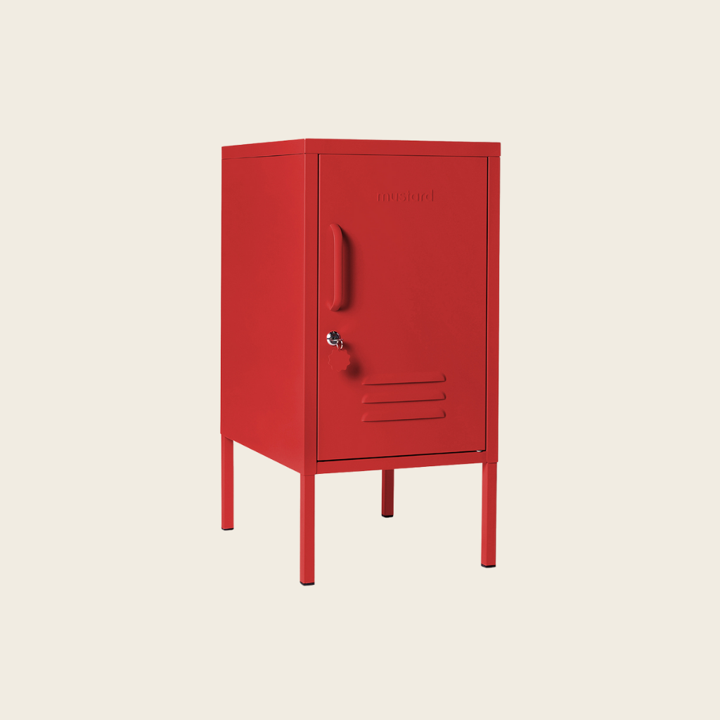 Red metal locker on a beige background