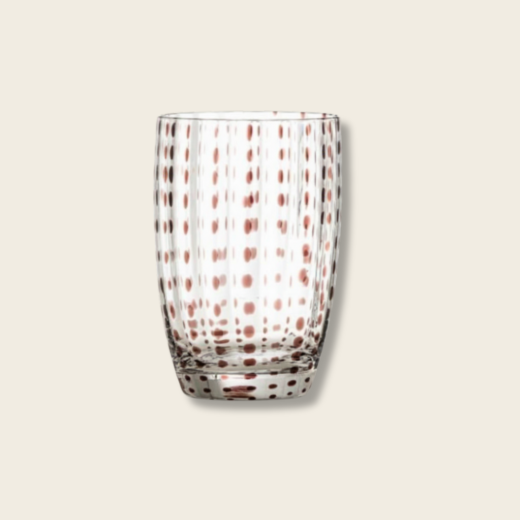 clear glass tumbler with brown spotted vertical lines