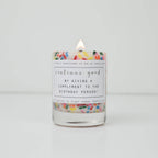 Candle with a colorful label on a white background