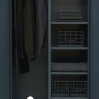 Closet with shelves and clothes, dimly lit