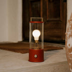 The Muse portable lamp in Pomona Red side view