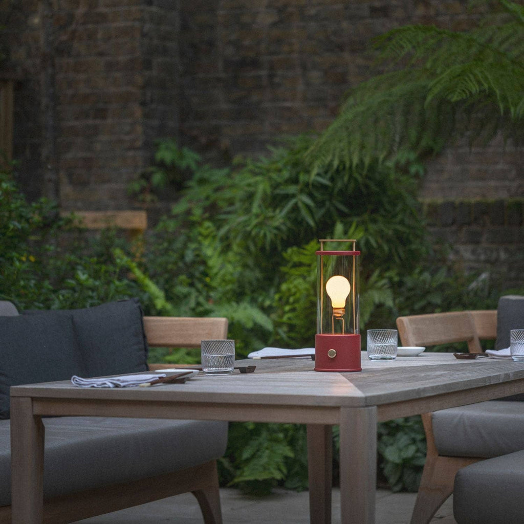 The Muse portable lamp in Pomona Red carry handle detail