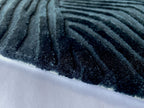 Close up of the Trace mineral rug showing the cut pile and fine contour lines