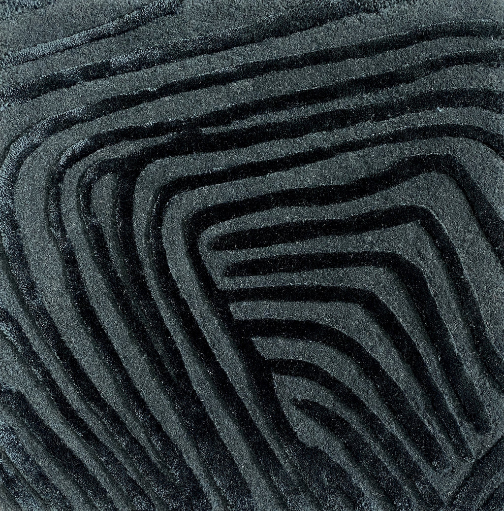 Detail of the Trace mineral rug pile in deep teal