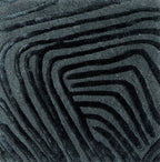 Detail of the Trace mineral rug pile in deep teal