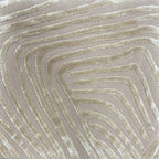 Detail of the Trace oyster rug pile in oatmeal greige