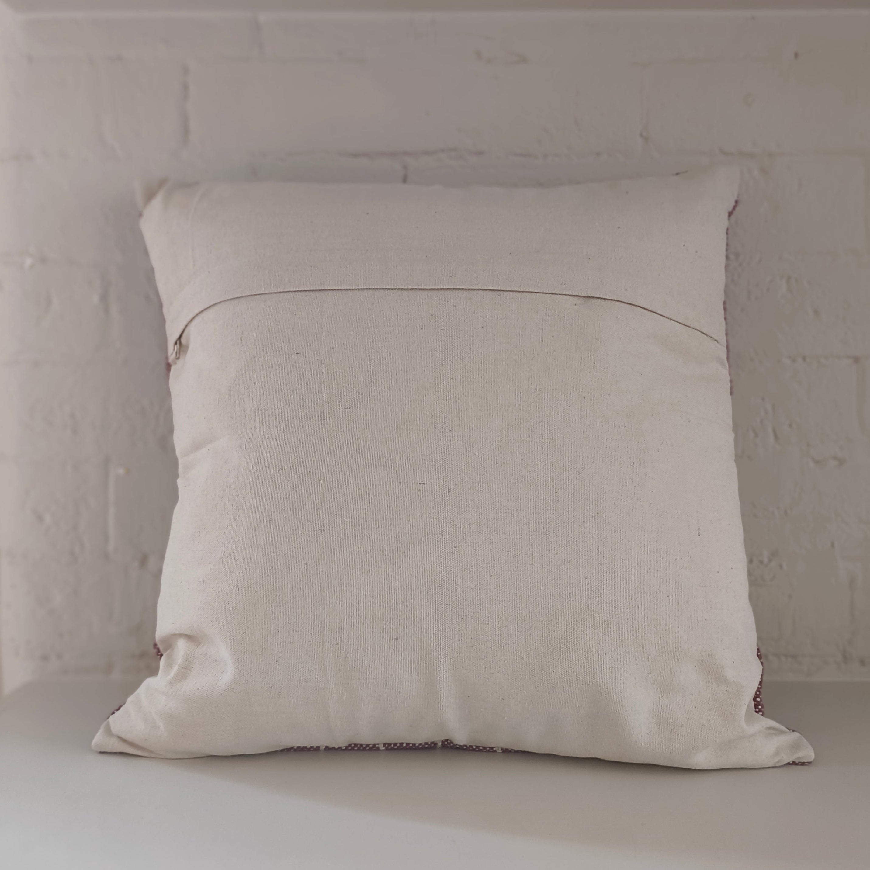 Back of plum stripe cushion