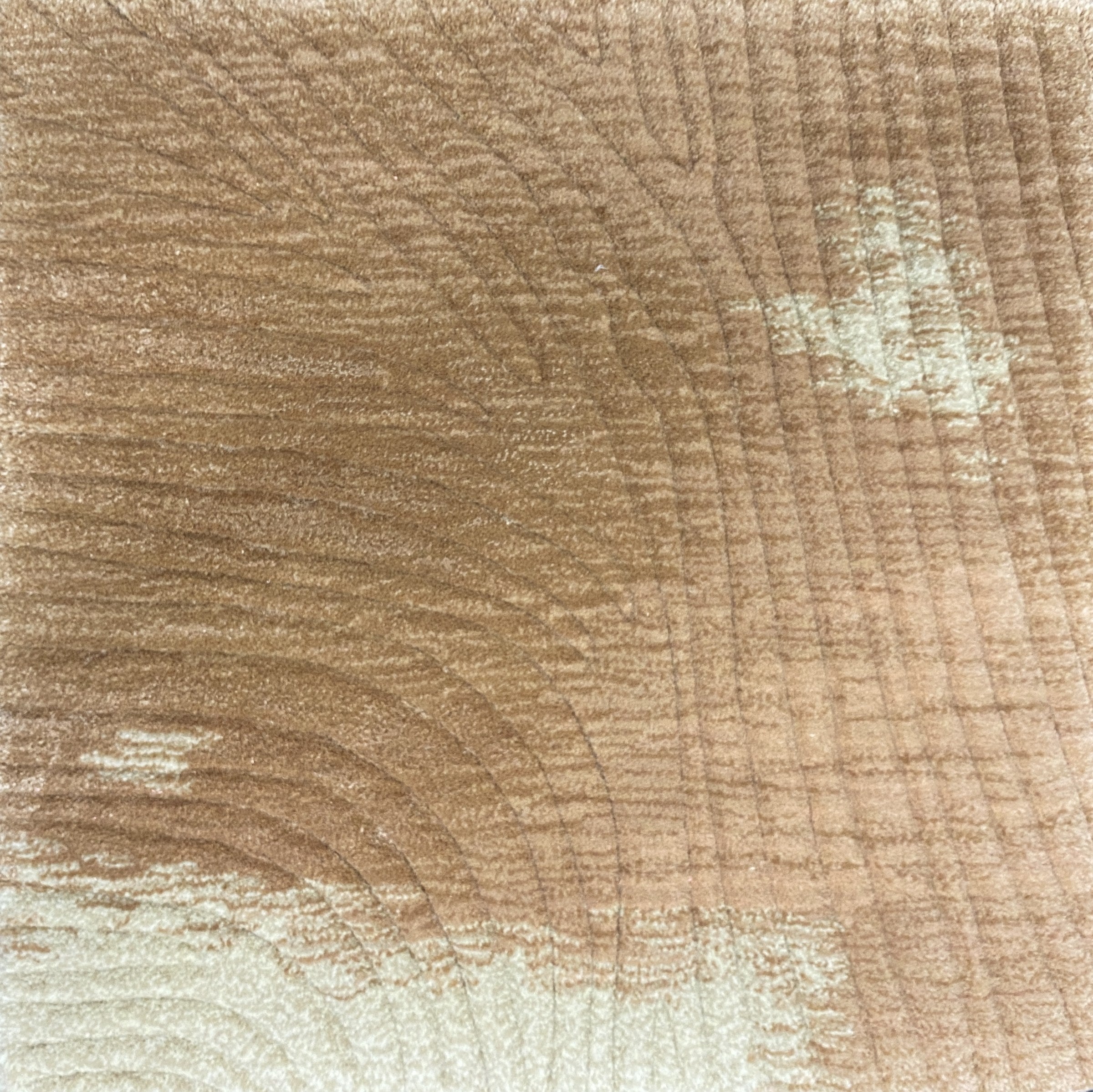 Detail of the Trove blush rug pile in clay pink with soft cream