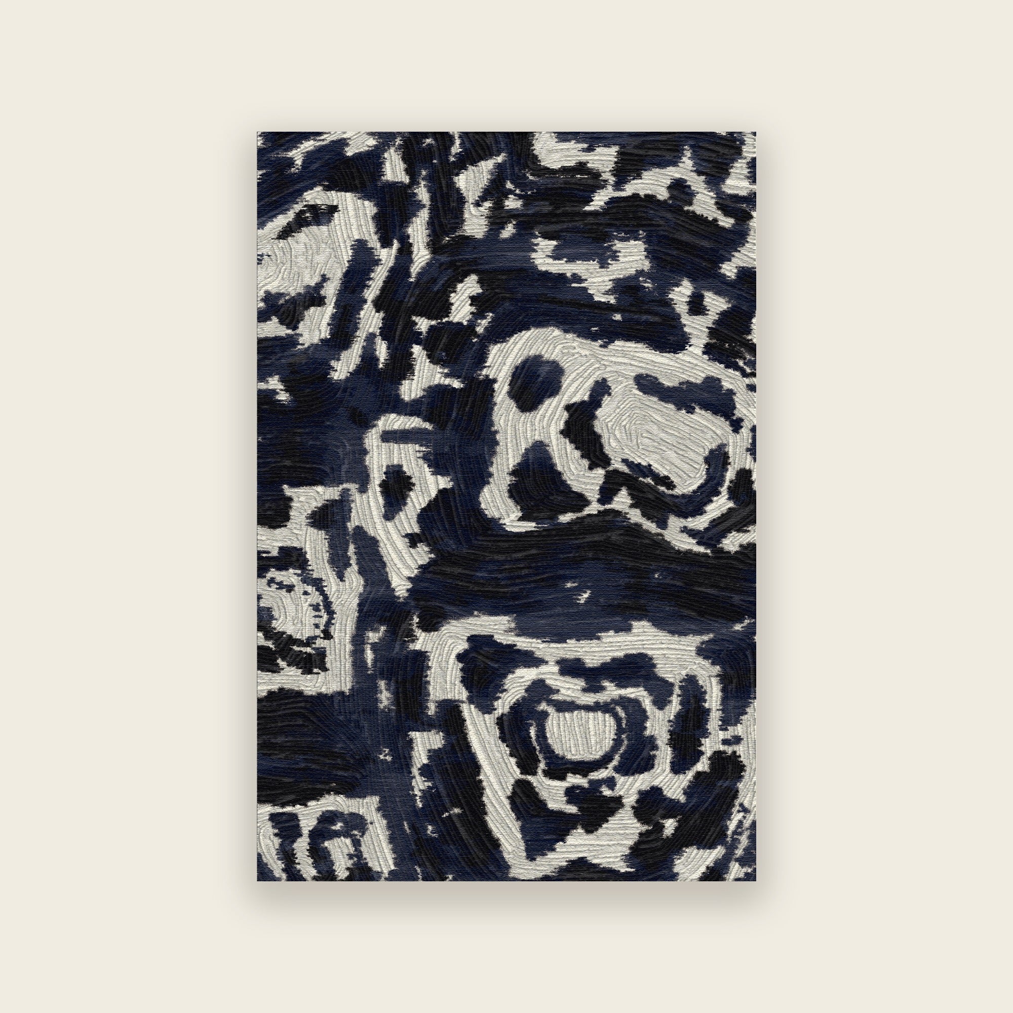 Trove hand tufted rug in midnight, a tortoiseshell design in inky navy and ivory, shown flat