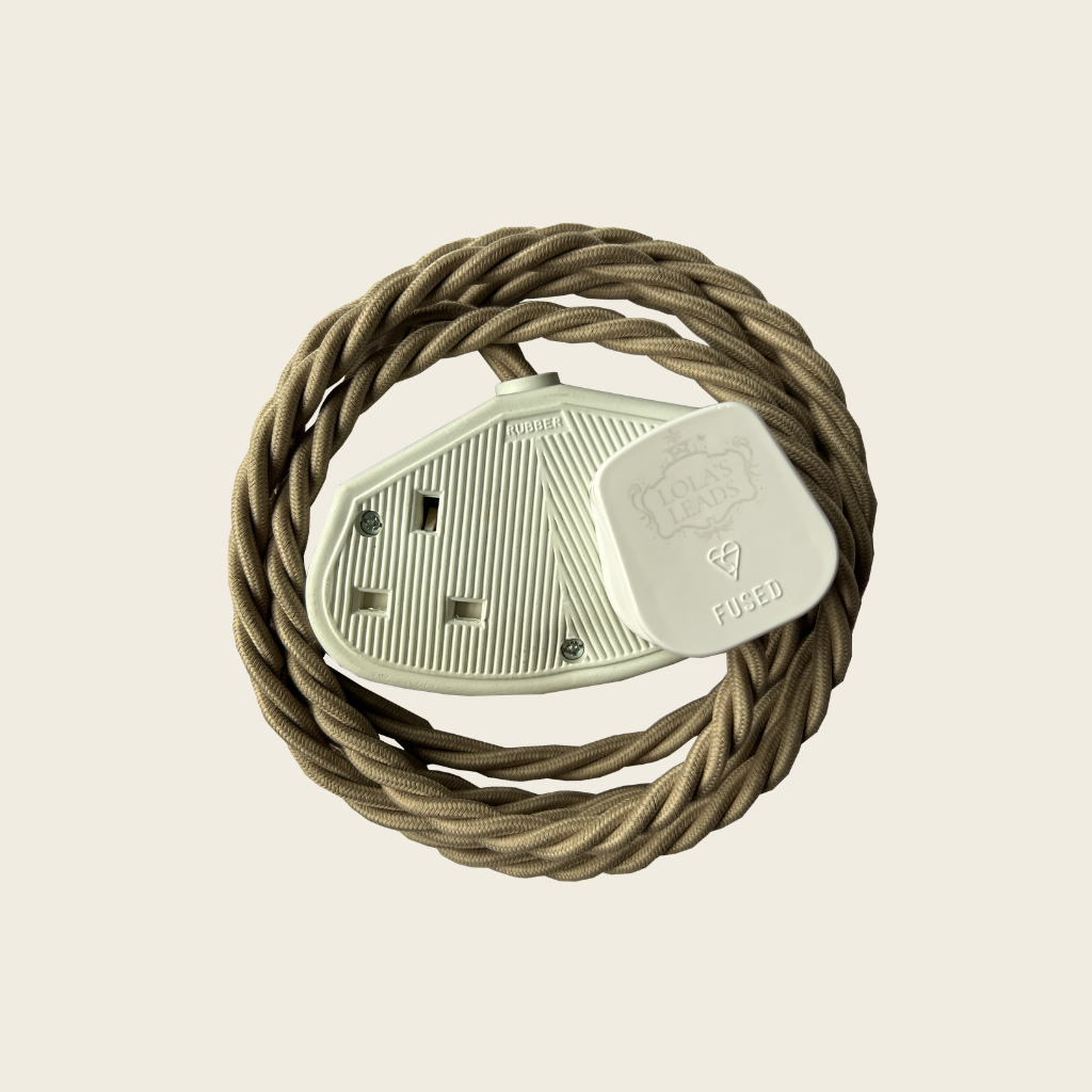 Footwear with braided brown sole on a beige background